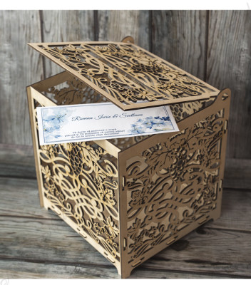 <p>Деревянная подарочная коробка оформлена лазерной резкой, используемая для конвертов. Это элегантный и полезный аксессуар одновременно. Может быть выполнена в стандартной или индивидуальной форме.</p>