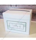 <p>Свадебная коробка для сбора денег, выполненная из белого картона с красивым дизайном. Это элегантный и полезный аксессуар одновременно.</p><p><strong>Свадебная коробка может быть дополнено:</strong></p><p>•&nbsp;Приглашением на свадьбу;</p><p>• Конвертом для приглашения;&nbsp;</p><p>• Вкладышем для конверта;</p><p>• Планом рассадки гостей;</p><p>• Конвертом для денег;</p><p>• Карточкой с номером стола;</p><p>• Бонбоньерка.</p><p>Все компоненты могут быть изготовлены как в комплекте, так и отдельно.&nbsp;</p><p><strong>ВНИМАНИЕ: </strong>В зависимости от типа бумаги, сложности модели и комплектации заказа, цена может меняться.&nbsp;</p><p>Любая идея может быть реализована !!!</p>
