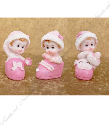 <p>Фигурка из керамики которая представляет ребенка на розовой туфельке. Идеальный аксессуар для мероприятия детей.</p>