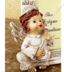 <p>Фигурка из керамики которая представляет&nbsp;фото-рамку с ангелом. Идеальный аксессуар для мероприятия детей.&nbsp;</p>
